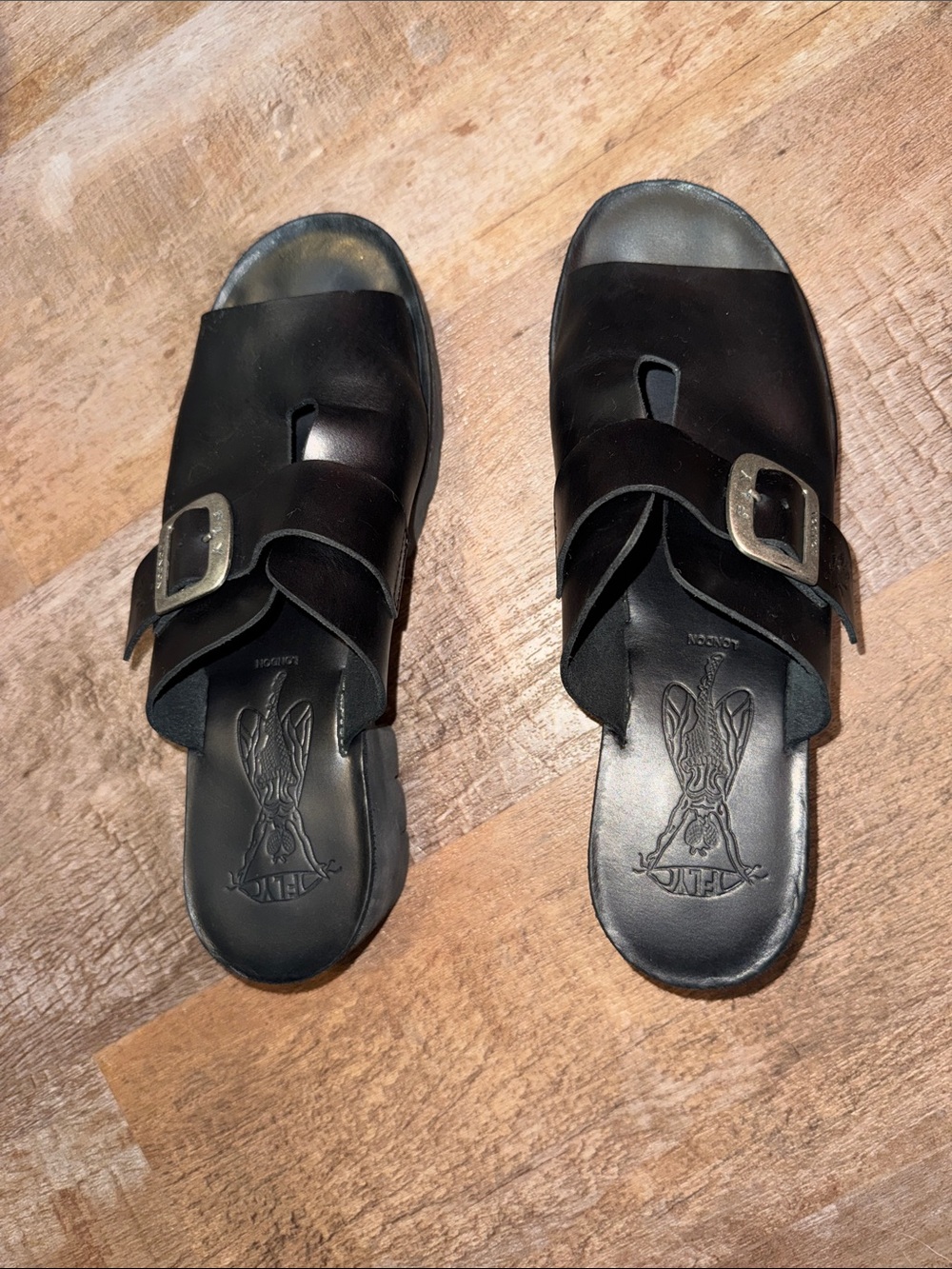 Fly London Black Leather Cozy445fly Mules with Silver Buckles